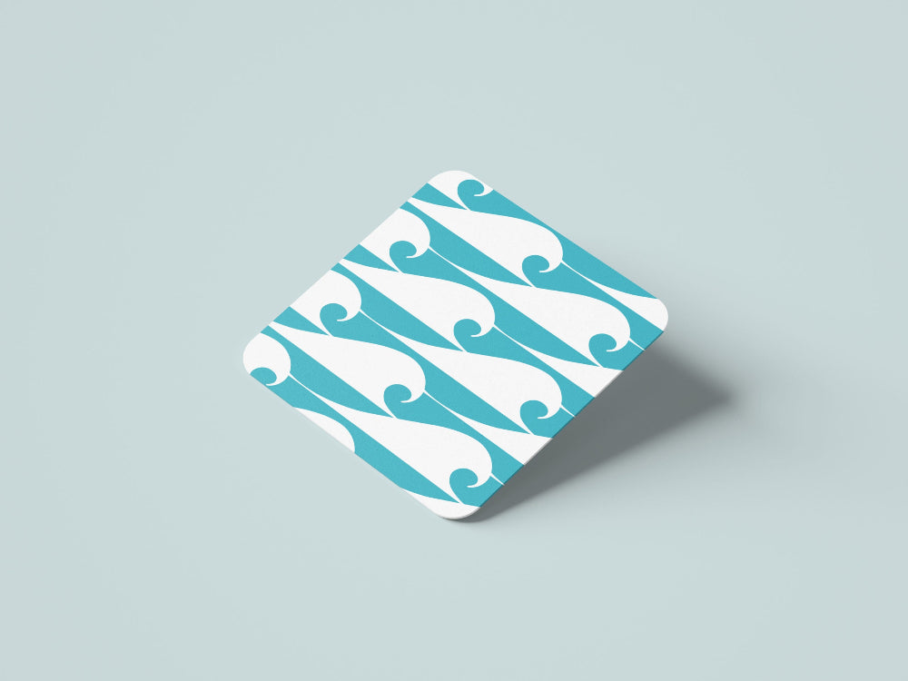 Square coaster with wave pattern on a light grey background