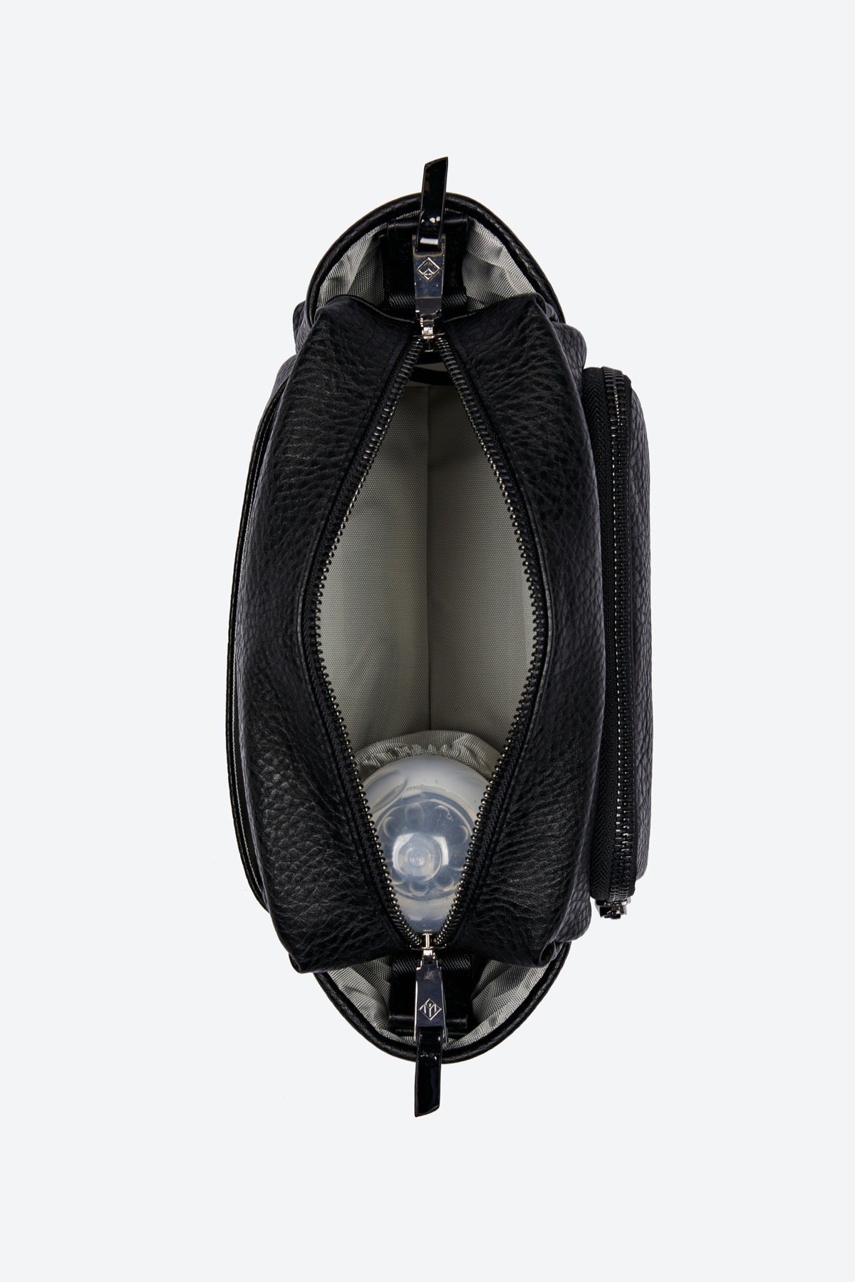 Black leather handbag with a white interior on a white background