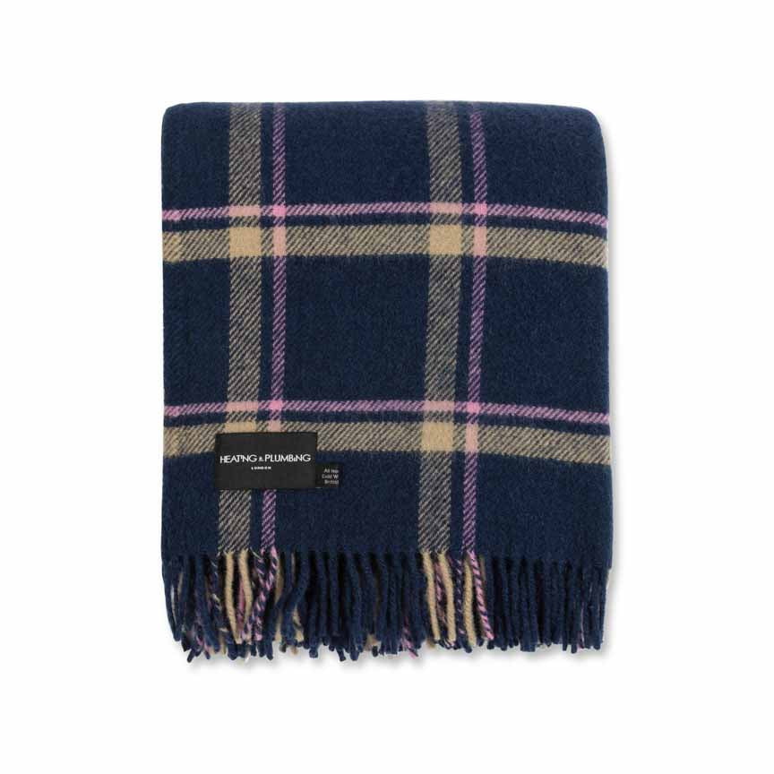 Navy blue plaid blanket with fringes on a white background