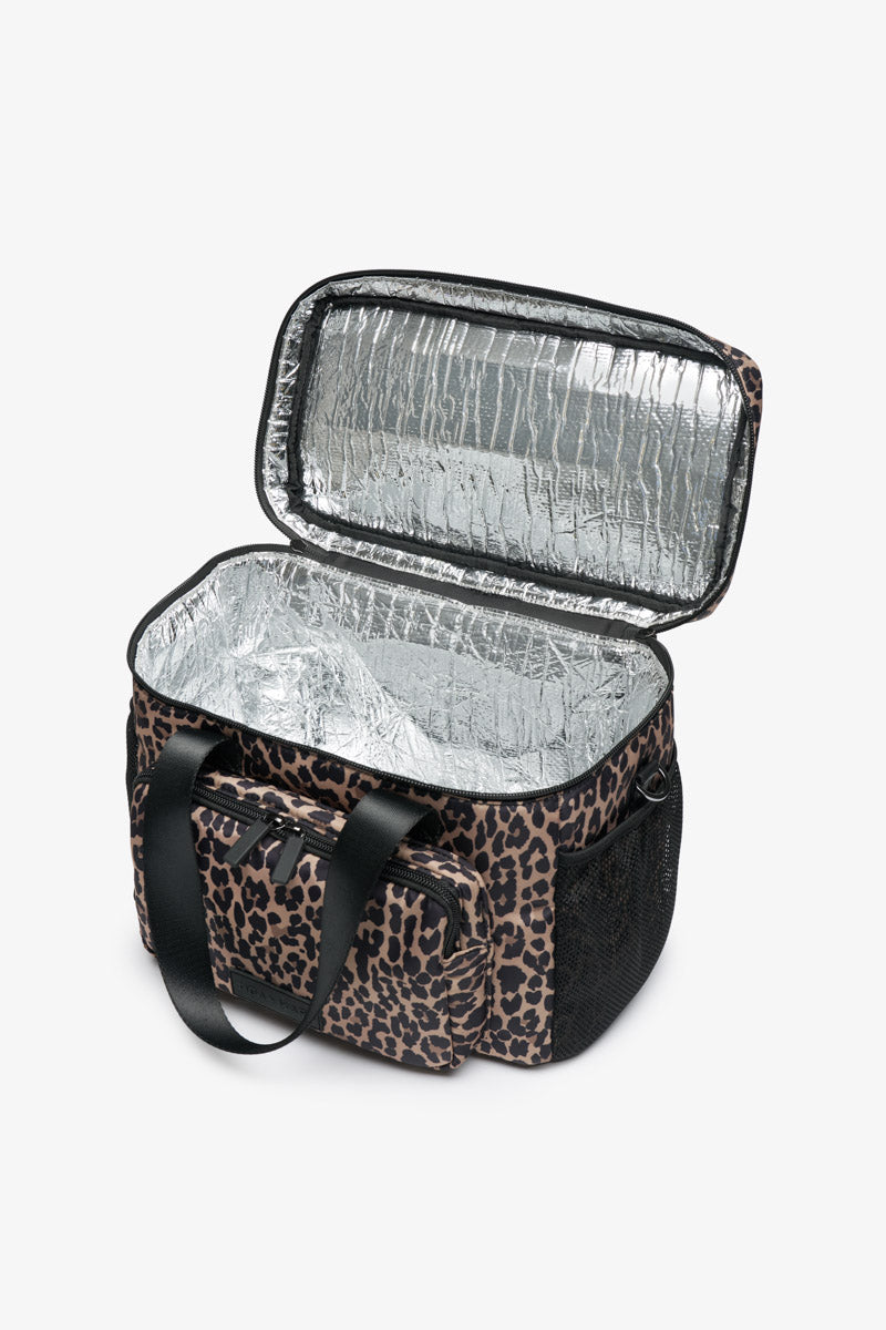Leopard print cooler bag with open lid showing reflective interior on a white background