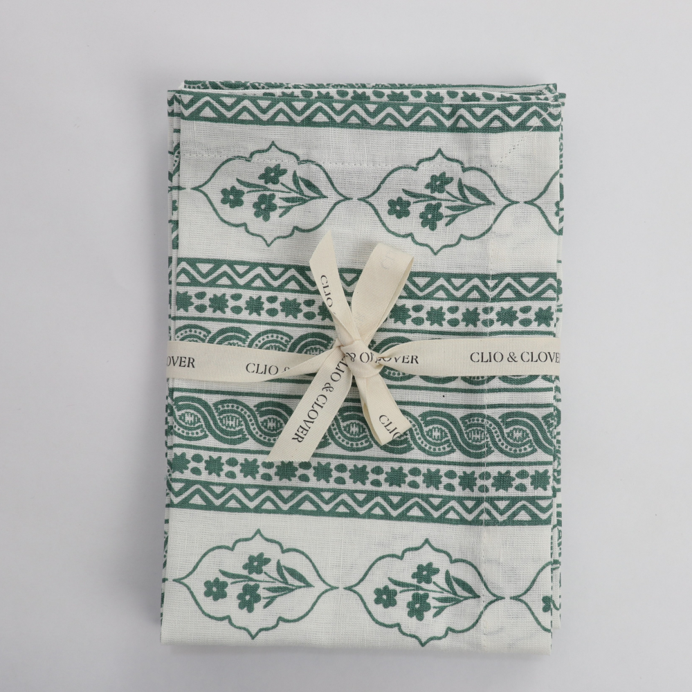 Packaged product with green and white pattern on a gray background