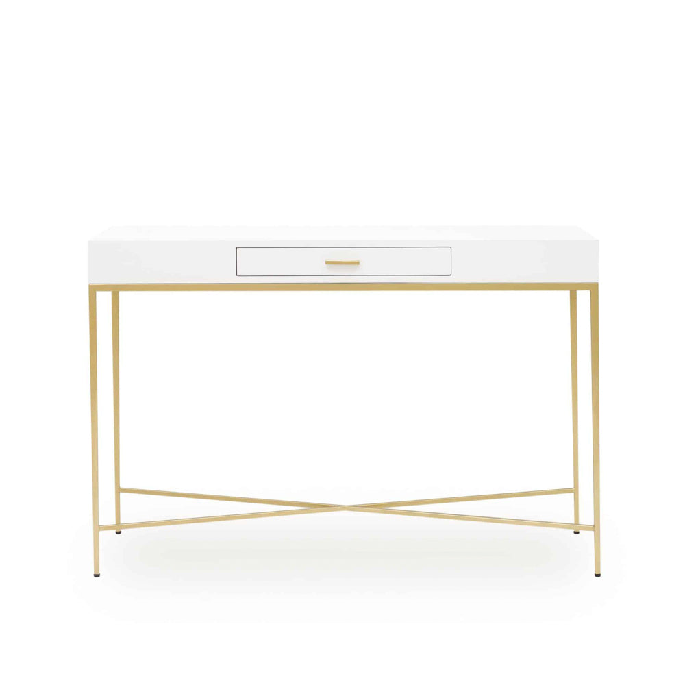A white high gloss console table with a single drawer and gold-finished tapered legs and bar handle.