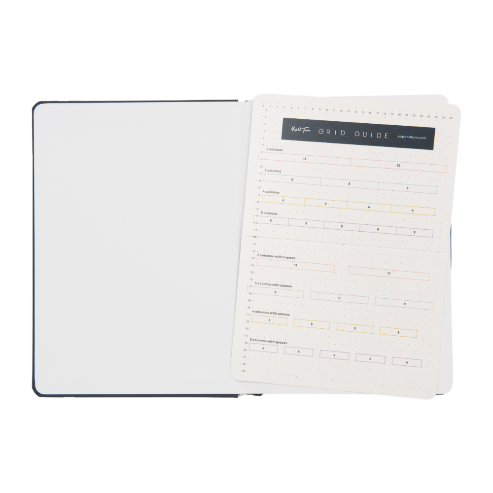 Open notebook with grid guide on a white background