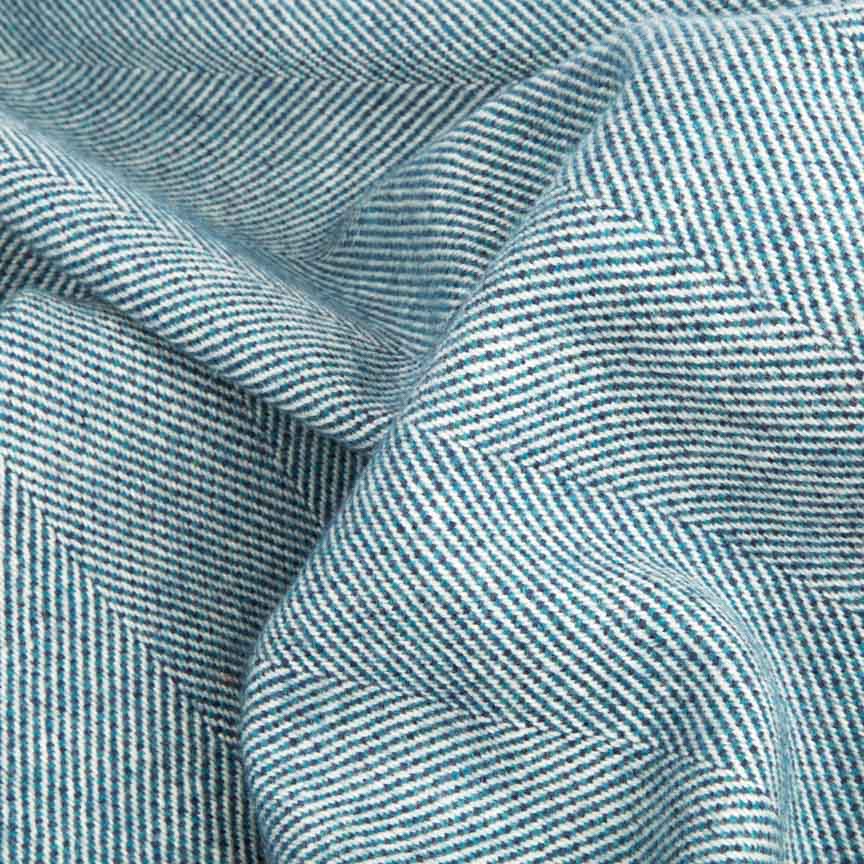 Close-up of Heating and Plumbing Blue blanket with a blue and white pattern