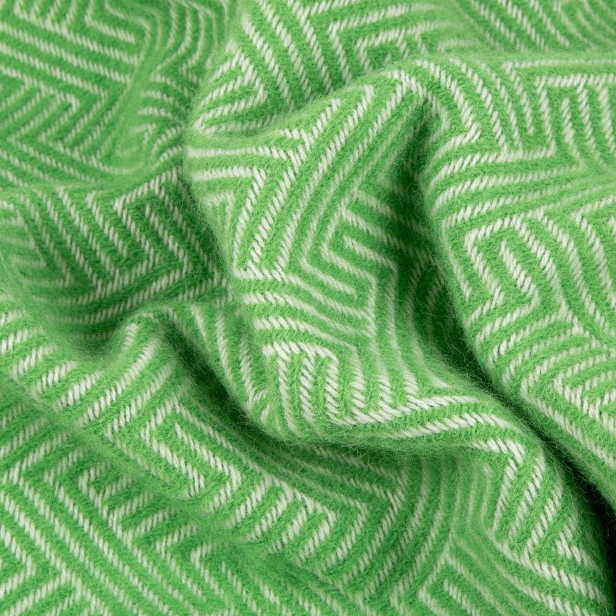 Close-up of green fabric with a zigzag pattern
