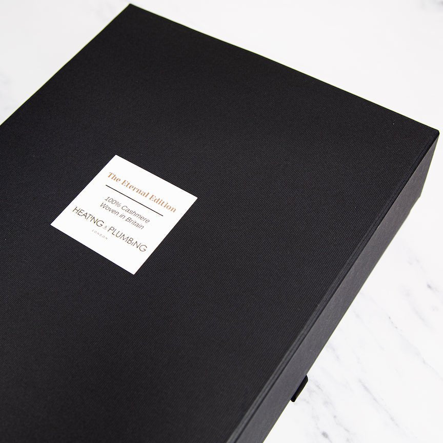 Black box with a label on a white background