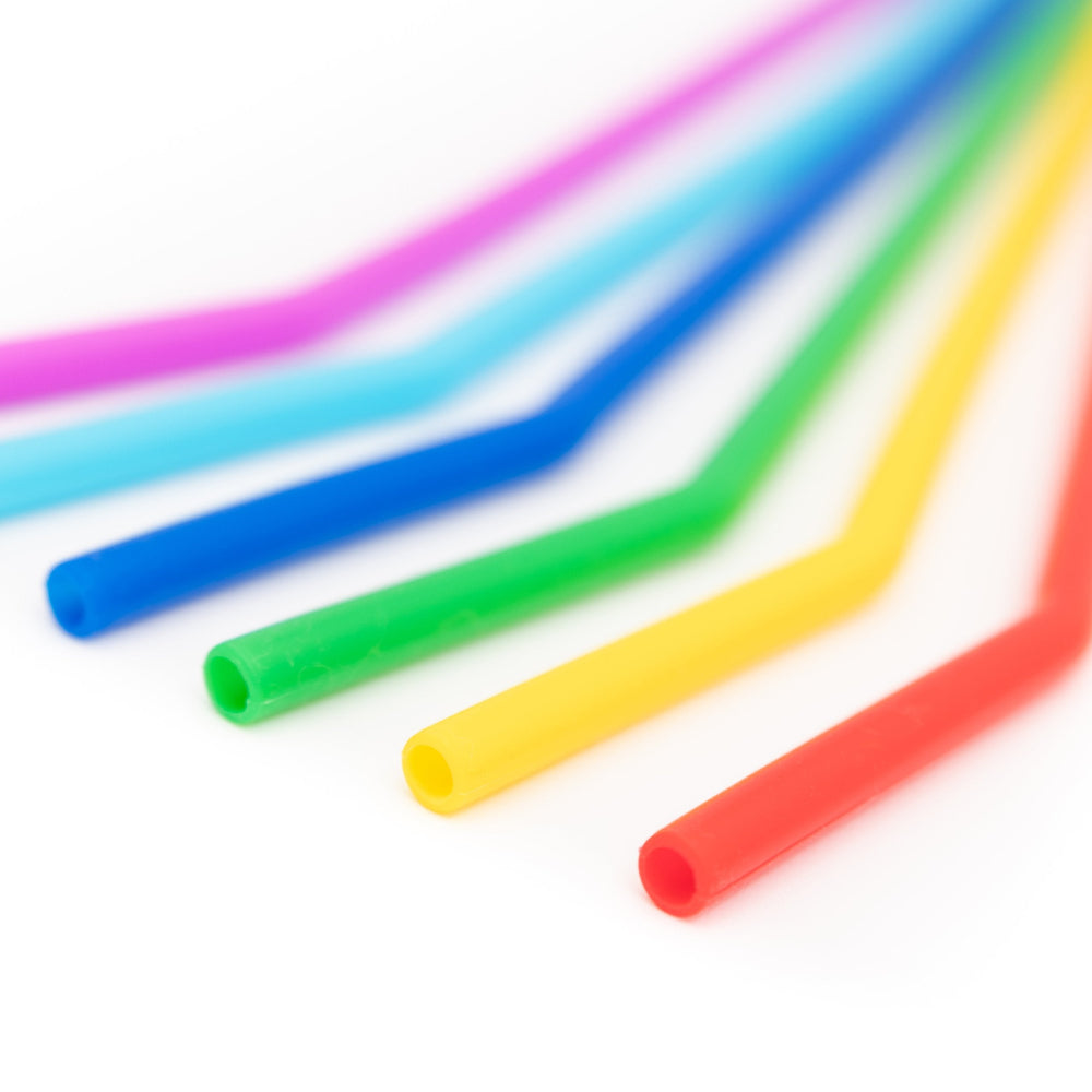 Set of colourful silicone straws on a white background