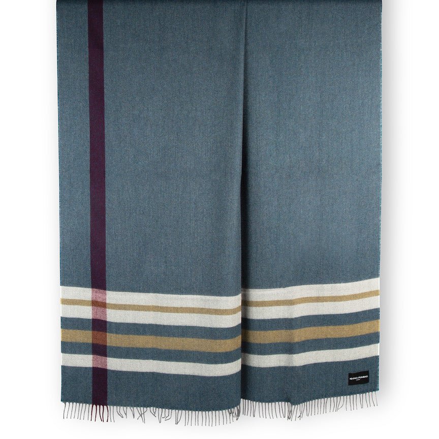 Blue blanket with plaid pattern on a white background