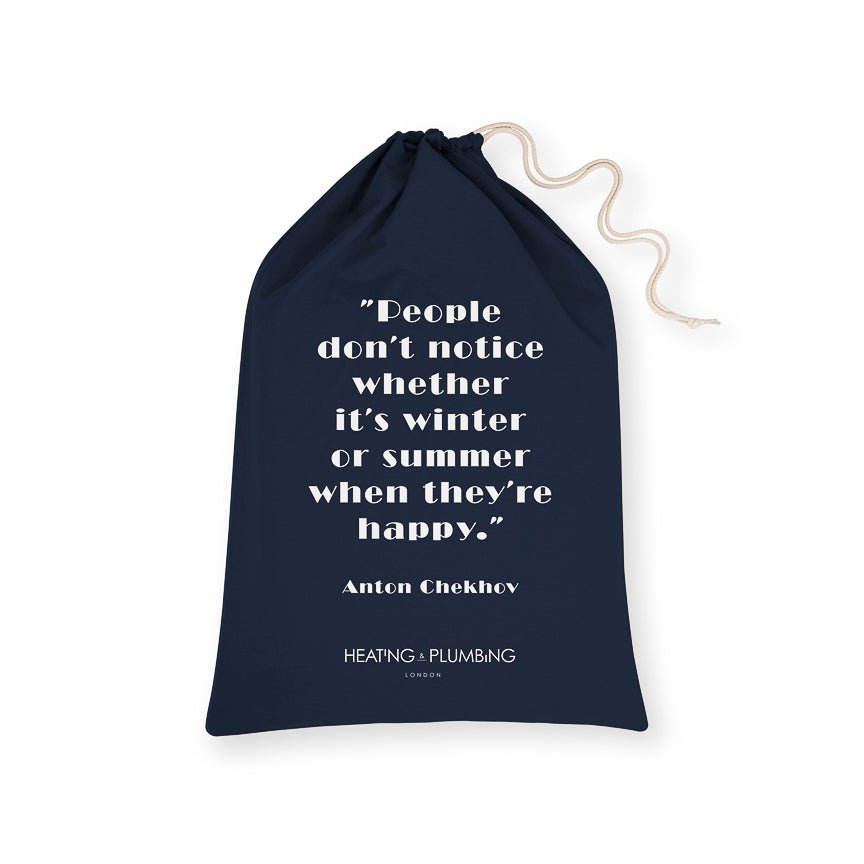 Navy drawstring bag with white text and 'Heating & Plumbing London' branding on a white background