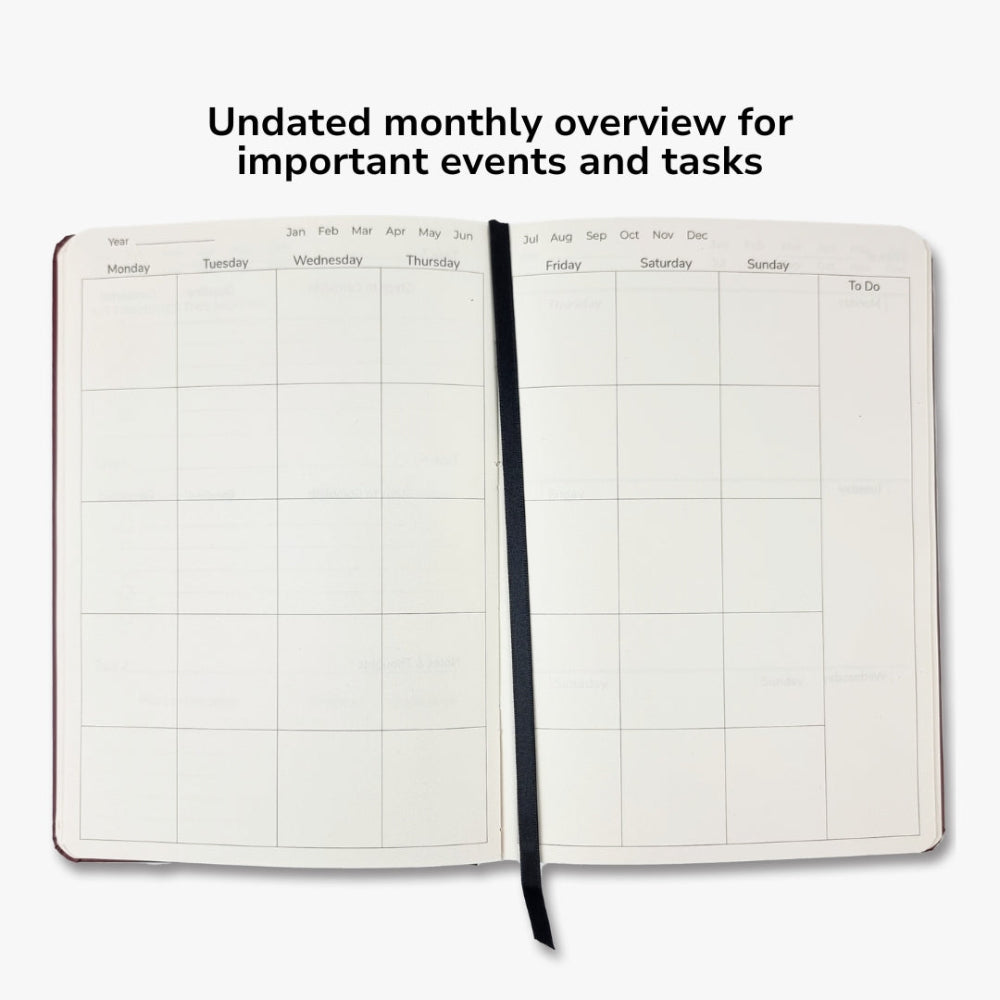 Open planner showing an undated monthly overview with days of the week and a to-do section.