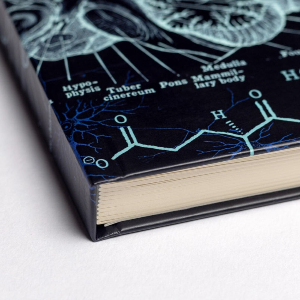 A5 neuroscience noteBook with a black cover featuring brain and chemical structure illustrations on a white background