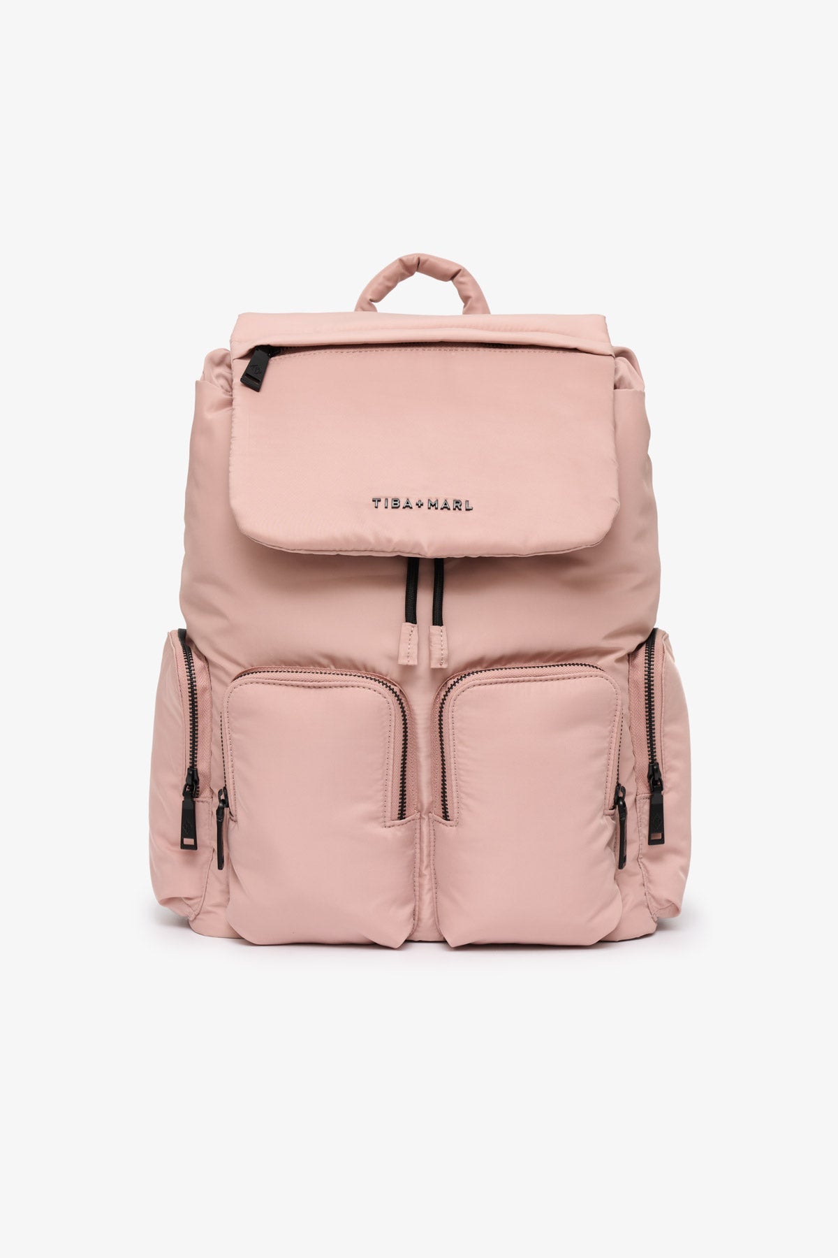 Pink backpack with a visible brand logo "Tiba + Marl" on a white background