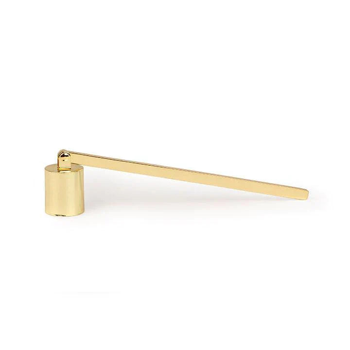 Gold candle snuffer on a white background