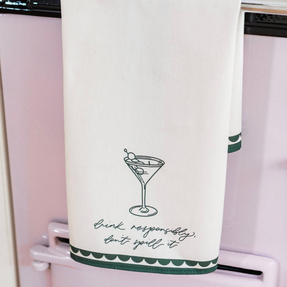 Tea Towel with a martini glass design and text on a white background