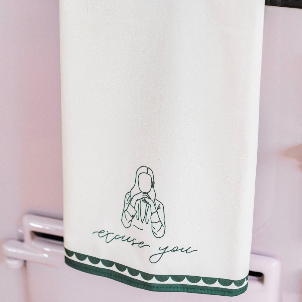 Tea Towel with 'excuse you' text on a towel rack