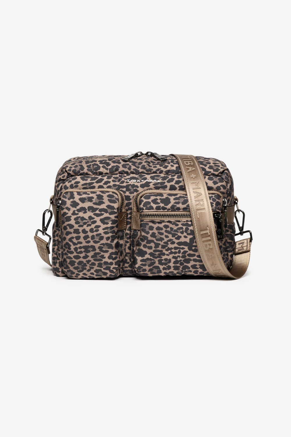 Leopard print bag with a brown strap on a white background