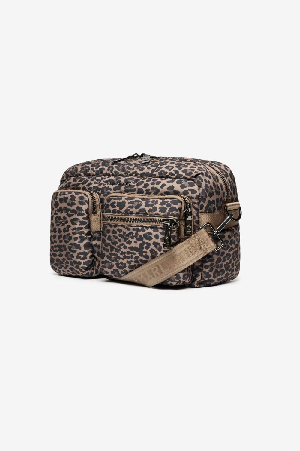 Leopard print bag with brown strap on a white background
