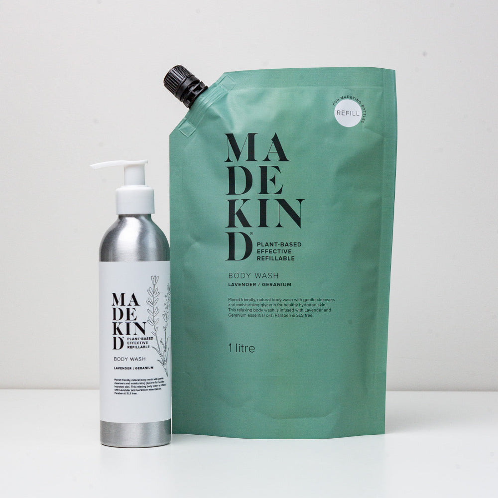 Made Kind body wash bottle and refill pouch on a white background