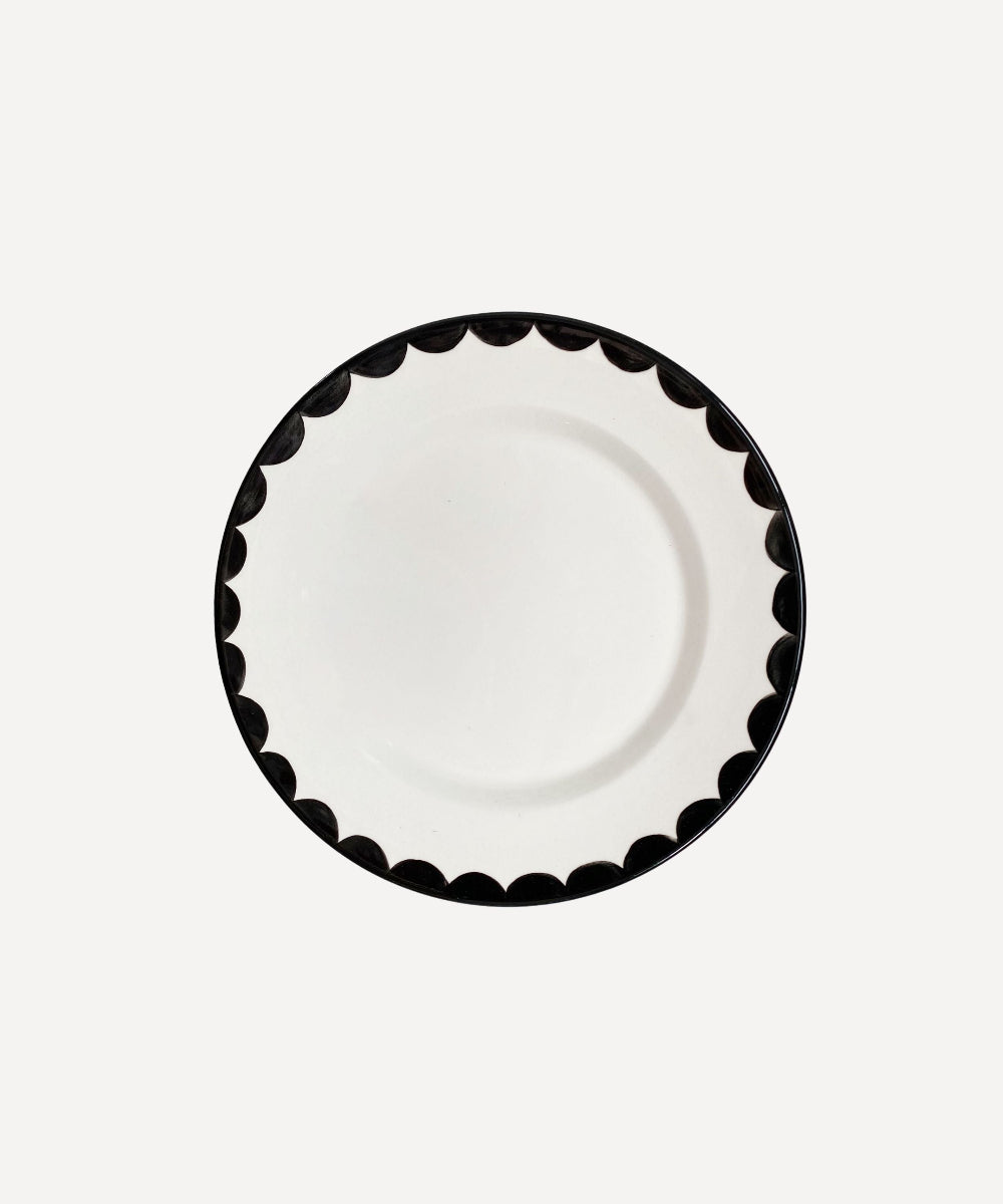 Ceramic Side Plate with jet black scalloped edge trim on a white background.