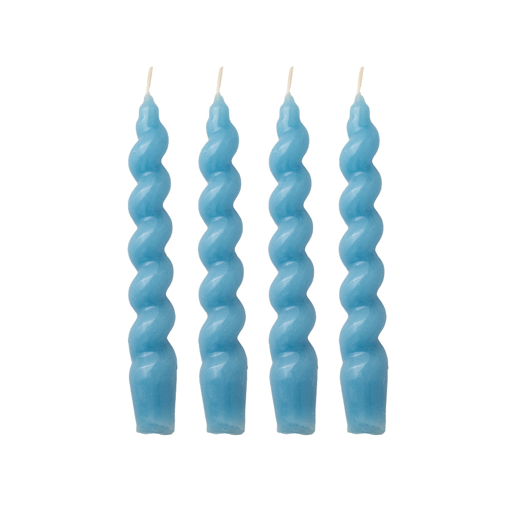 Four blue spiral candles on a white background