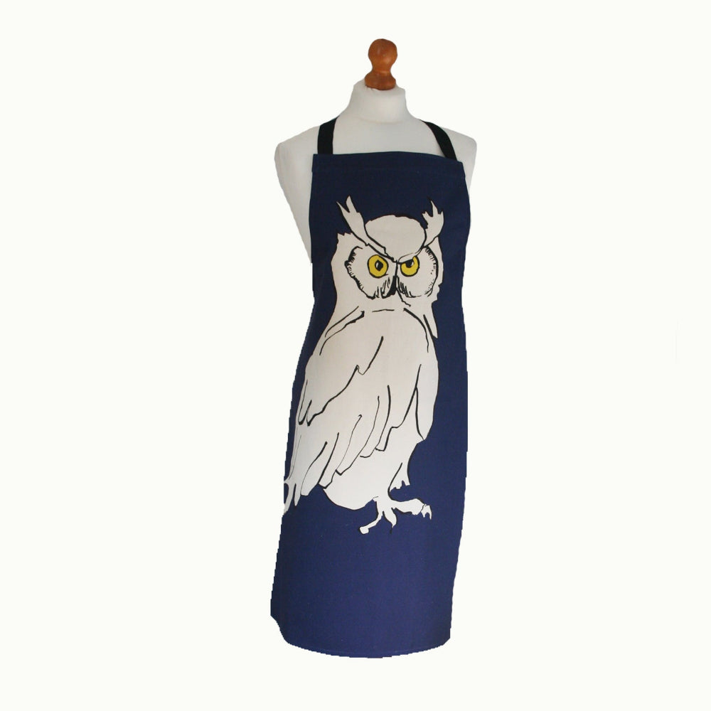 Navy apron with an owl design on a mannequin against a white background