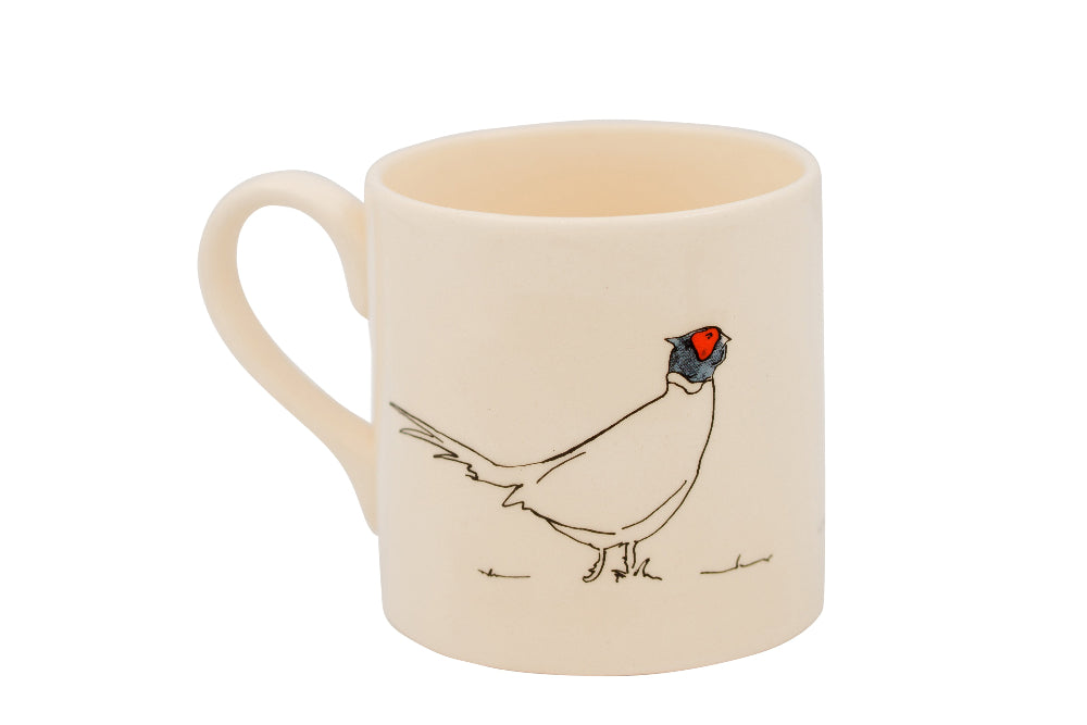 Beige mug with a Pheasant illustration on a white background