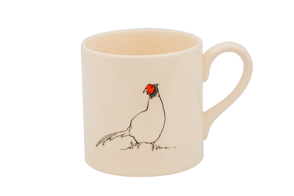 Beige mug with a bird Pheasant illustration on a white background