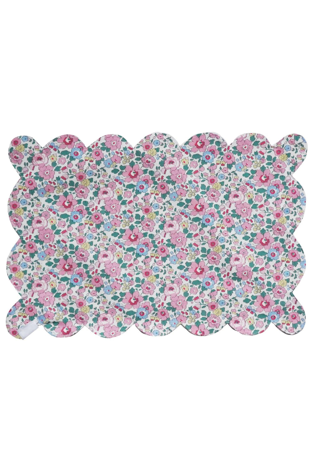 Coco Wolf Floral patterned Liberty placemat with scalloped edge on a white background