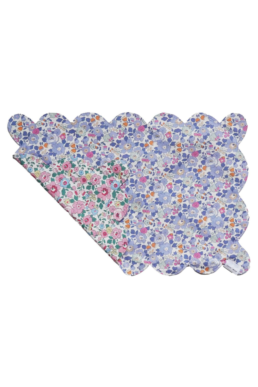 Liberty Floral patterned placemat with scalloped edge on a white background