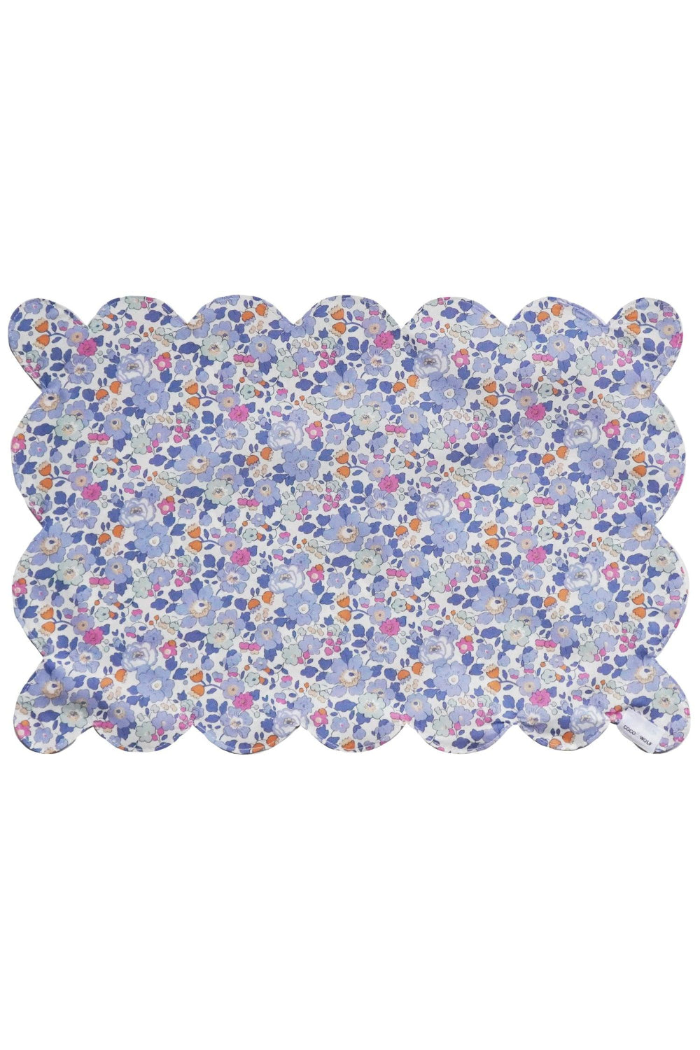Liberty Floral patterned placemat with scalloped edge on a white background