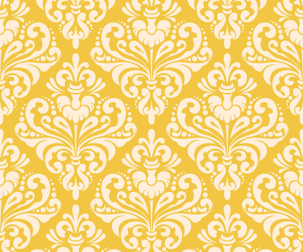Decorative Damask pattern with white flourishes on a yellow background