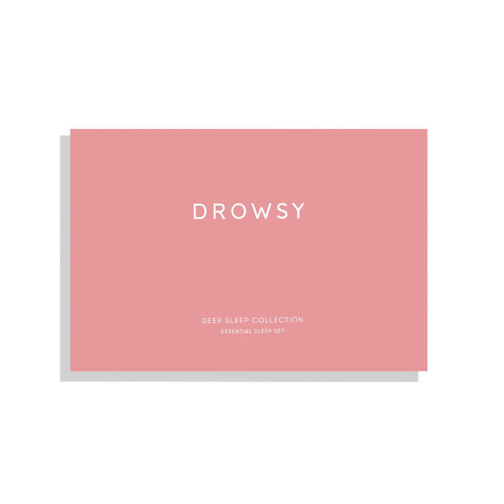 Pink packaging with 'Drowsy' text on a white background "Deep sleep collection' The essential sleep set