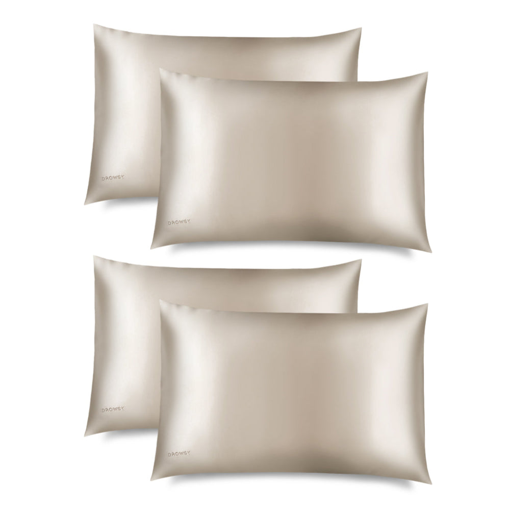 Drowsy Four Dusty Gold Silk pillowcases on a white background