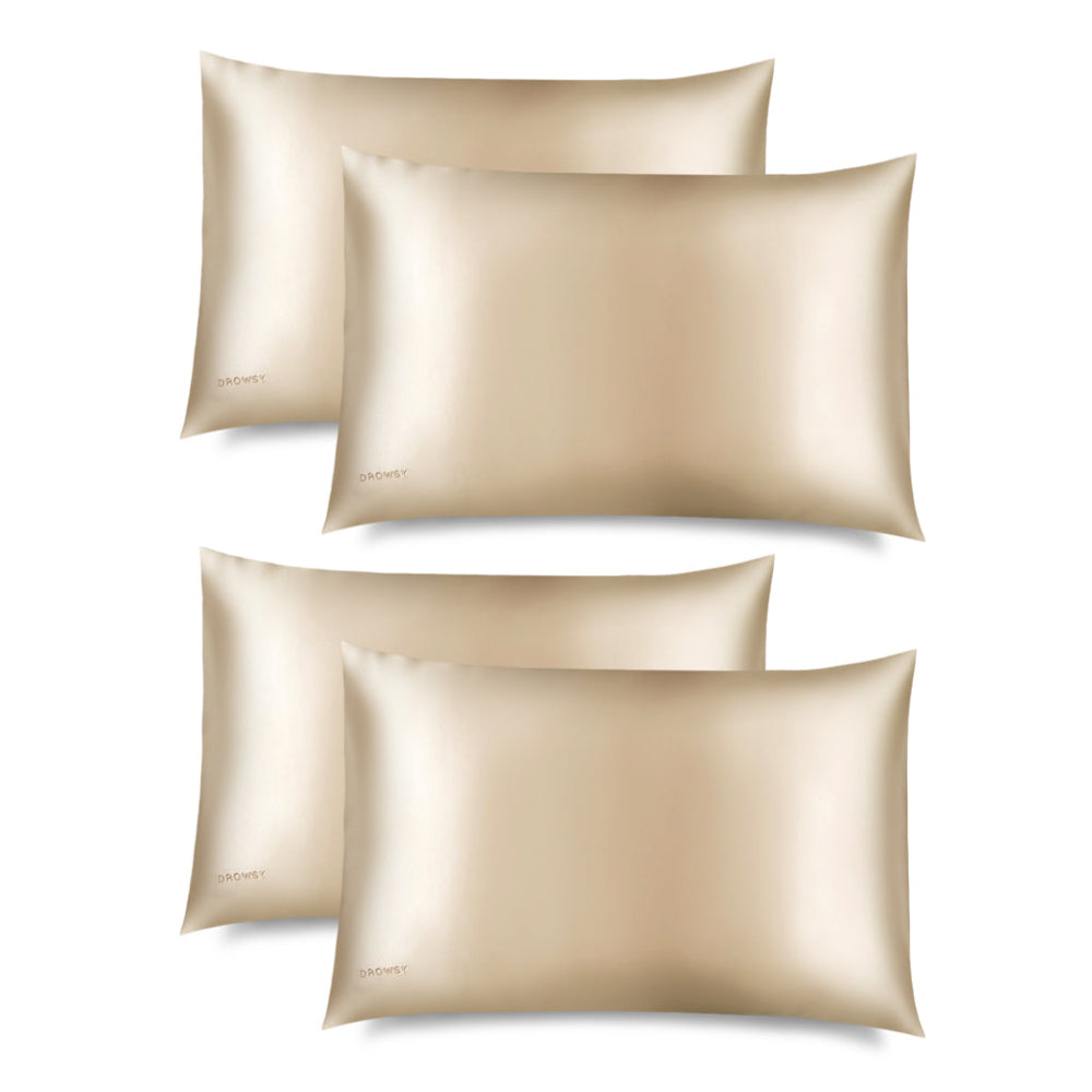 Four Dusty Gold pillowcases on a white background