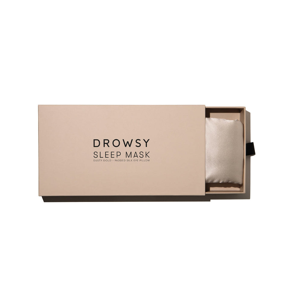 Drowsy silk Sleep mask in a beige box on a white background