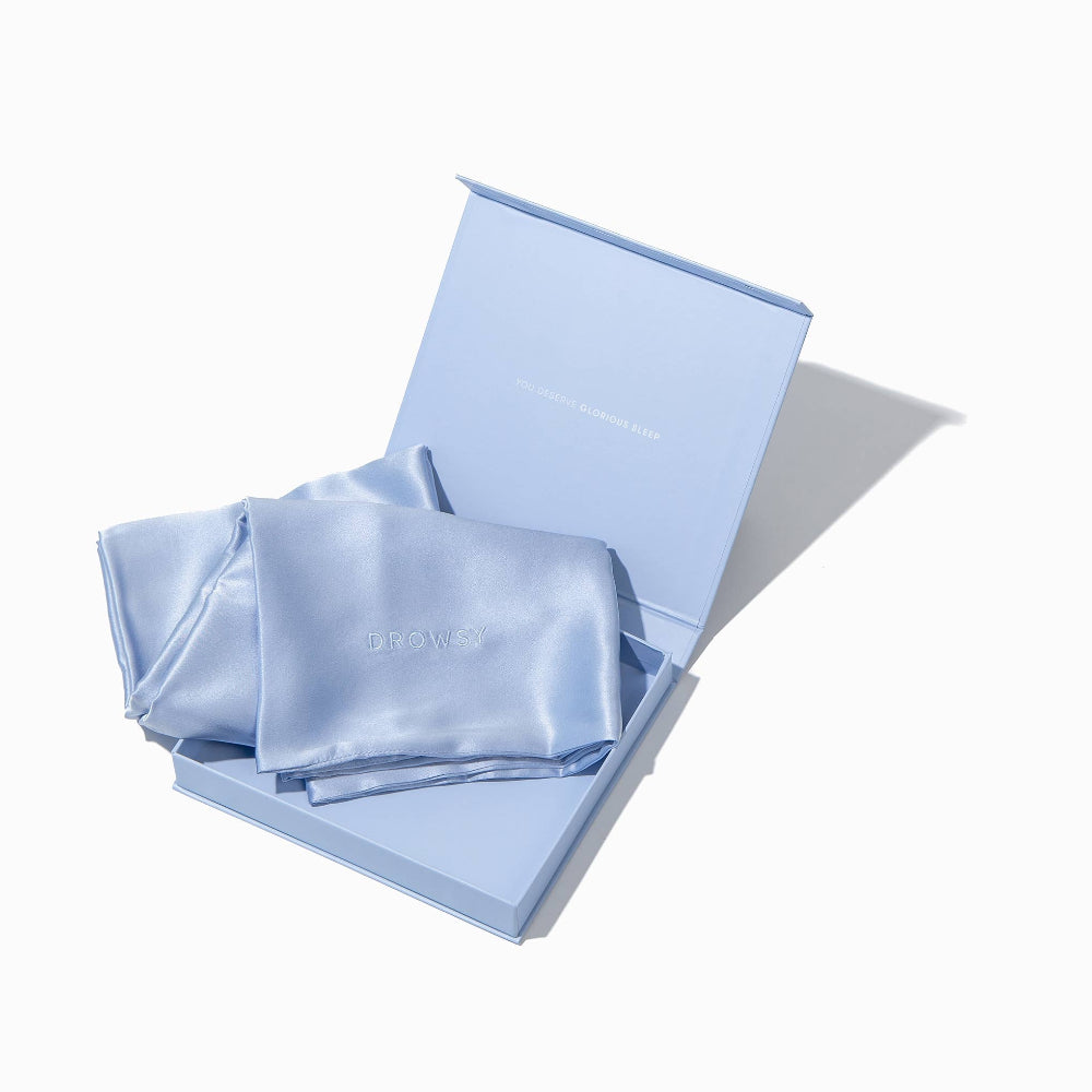 Opened Drowsy Silk Blue Belle Pillowcase in matching coloured packaging