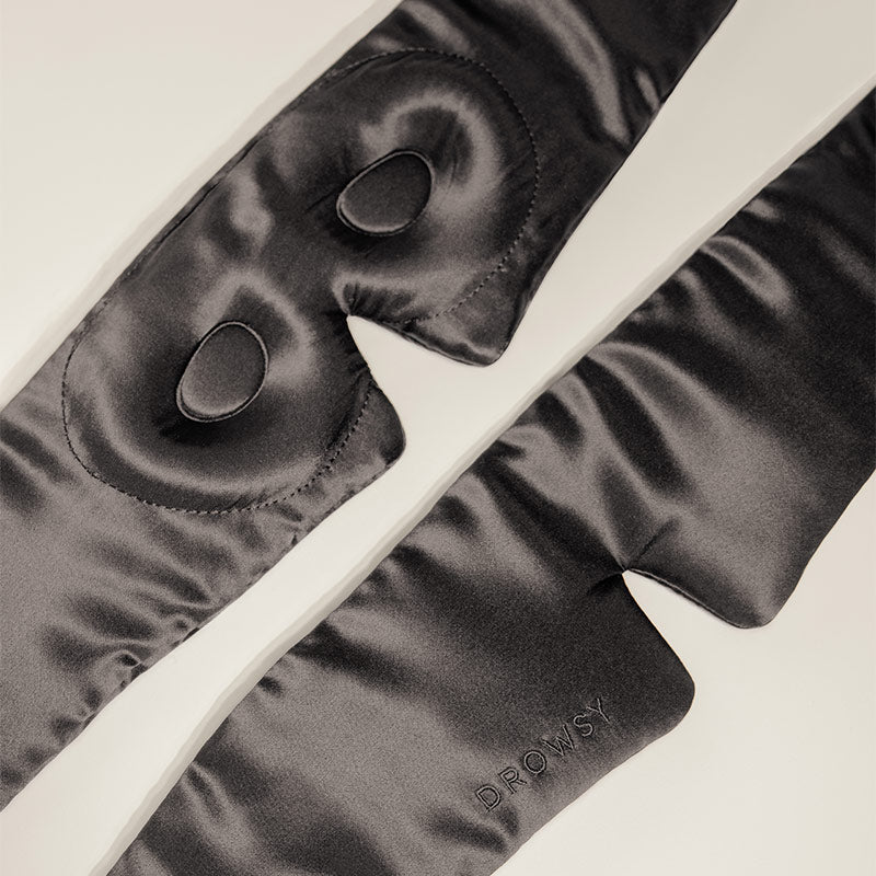 Close-up of silk sleep eye mask front and back view