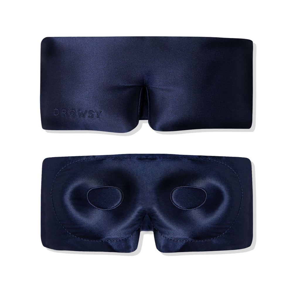 Two navy blue sleep masks on a white background showing inner and outer product view.