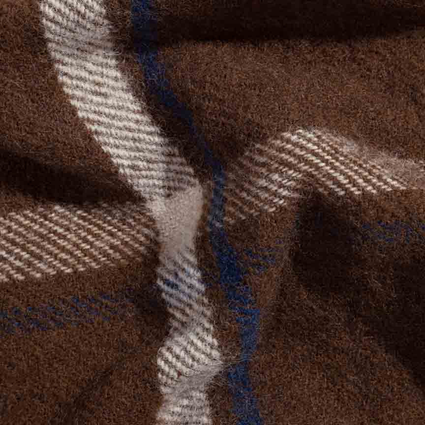Close-up of brown plaid blanket with a checkered pattern