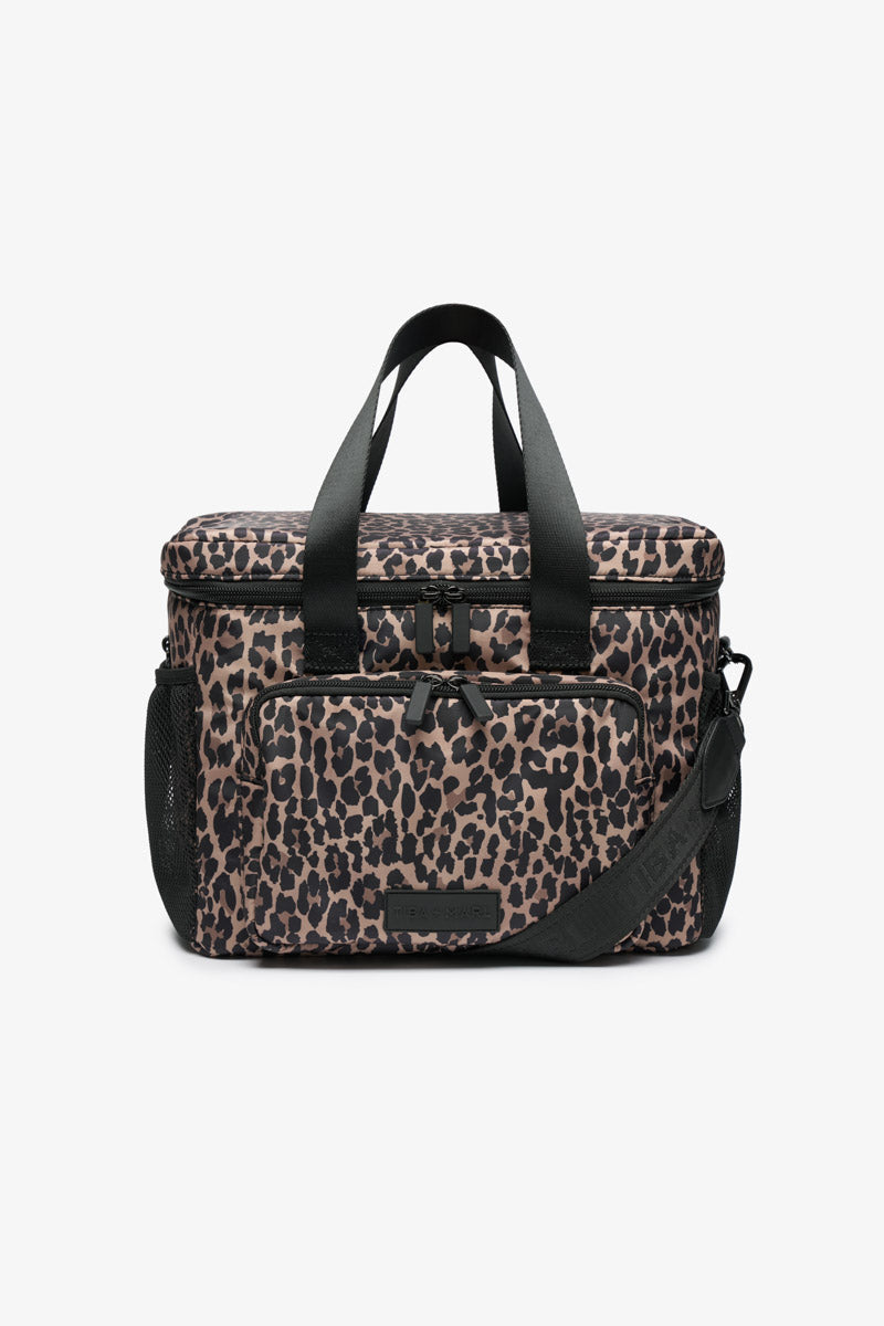 Leopard print bag coolbag with black straps on a white background