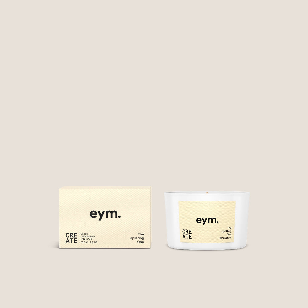 Create eym mini candle with packaging on a beige background