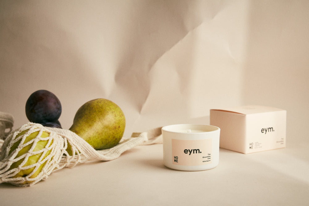 eym product with fruits and a mesh bag on a neutral background