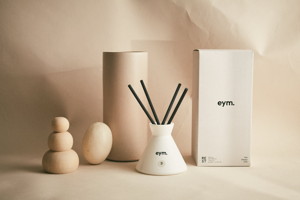 EYM diffuser set called 'Rest' with packaging on a beige background
