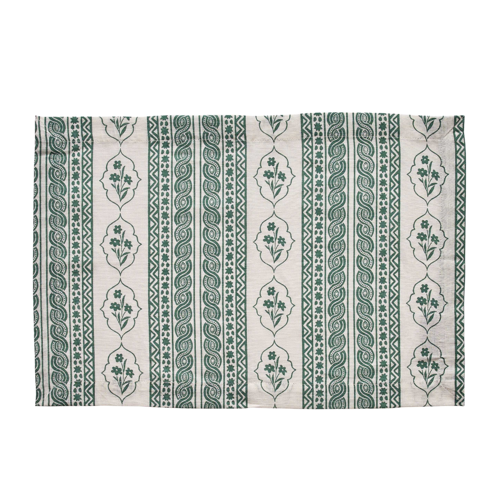 Patterned placemat with Emerald green and beige design on a white background