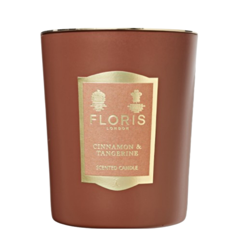 Floris London Cinnamon and Tangerine scented candle with a gold label and gold lid on a white background
