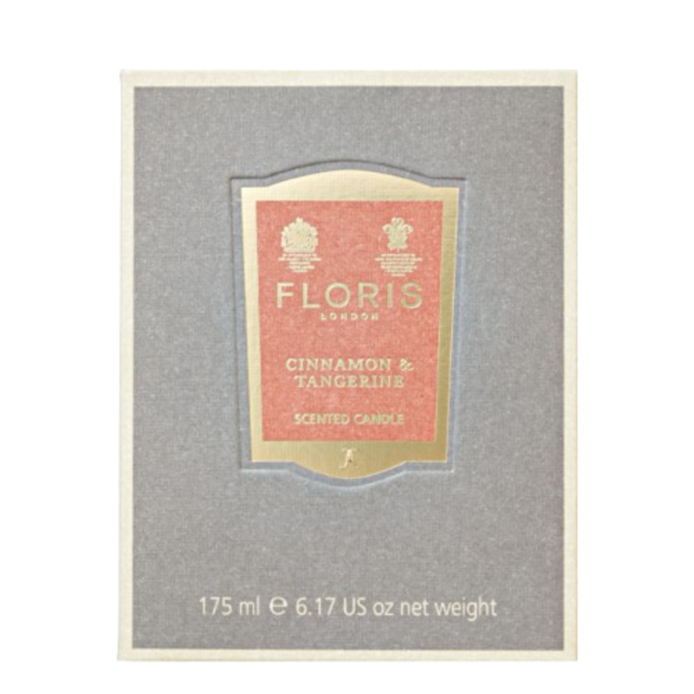 Floris London cinnamon and tangerine scented candle packaging on a grey background