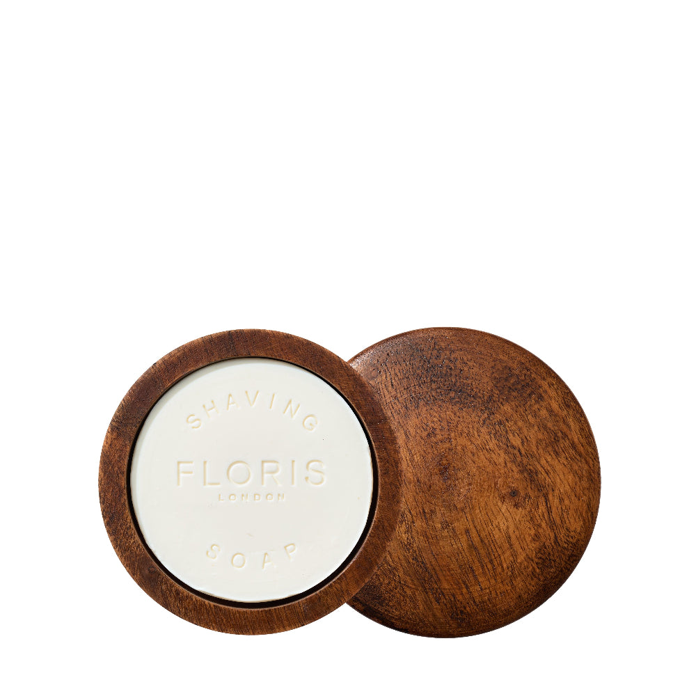 Floris soap in a wooden container on a white background