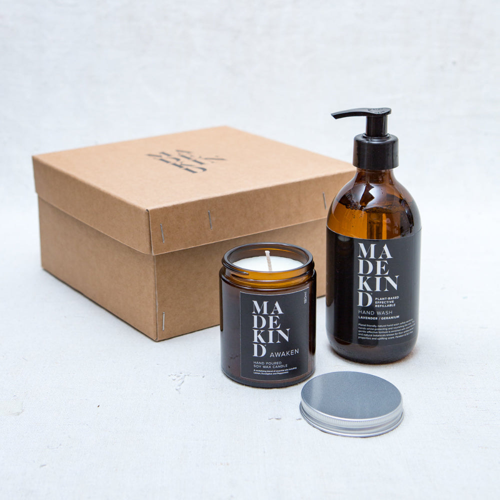 Madekind candle and hand wash with packaging on a white background