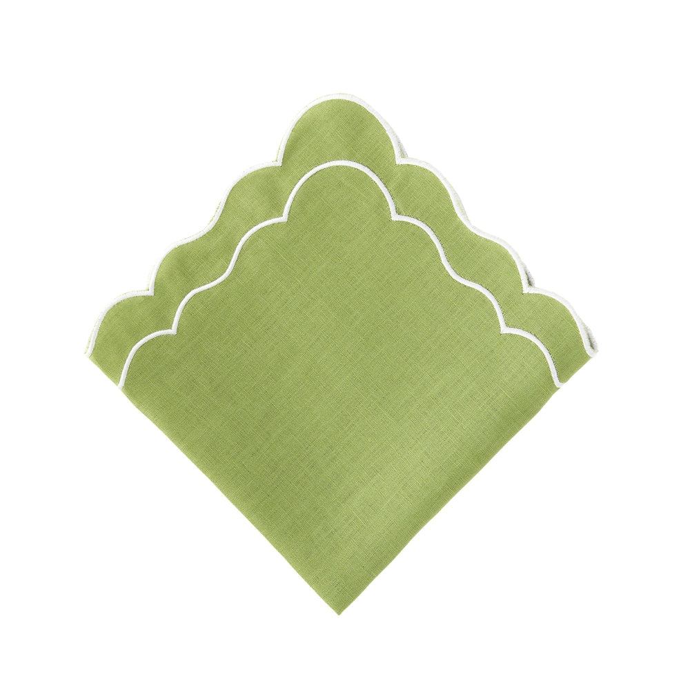 Green scalloped placemat on a white background