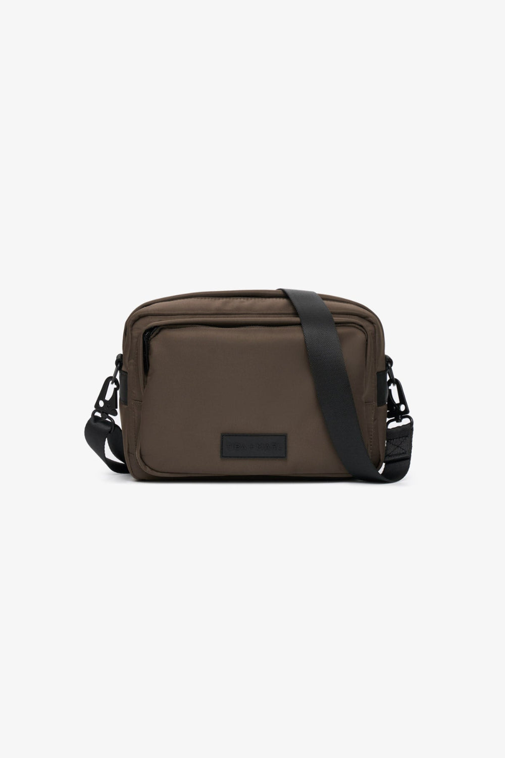 Hiro Brown crossbody bag with black strap on a white background 